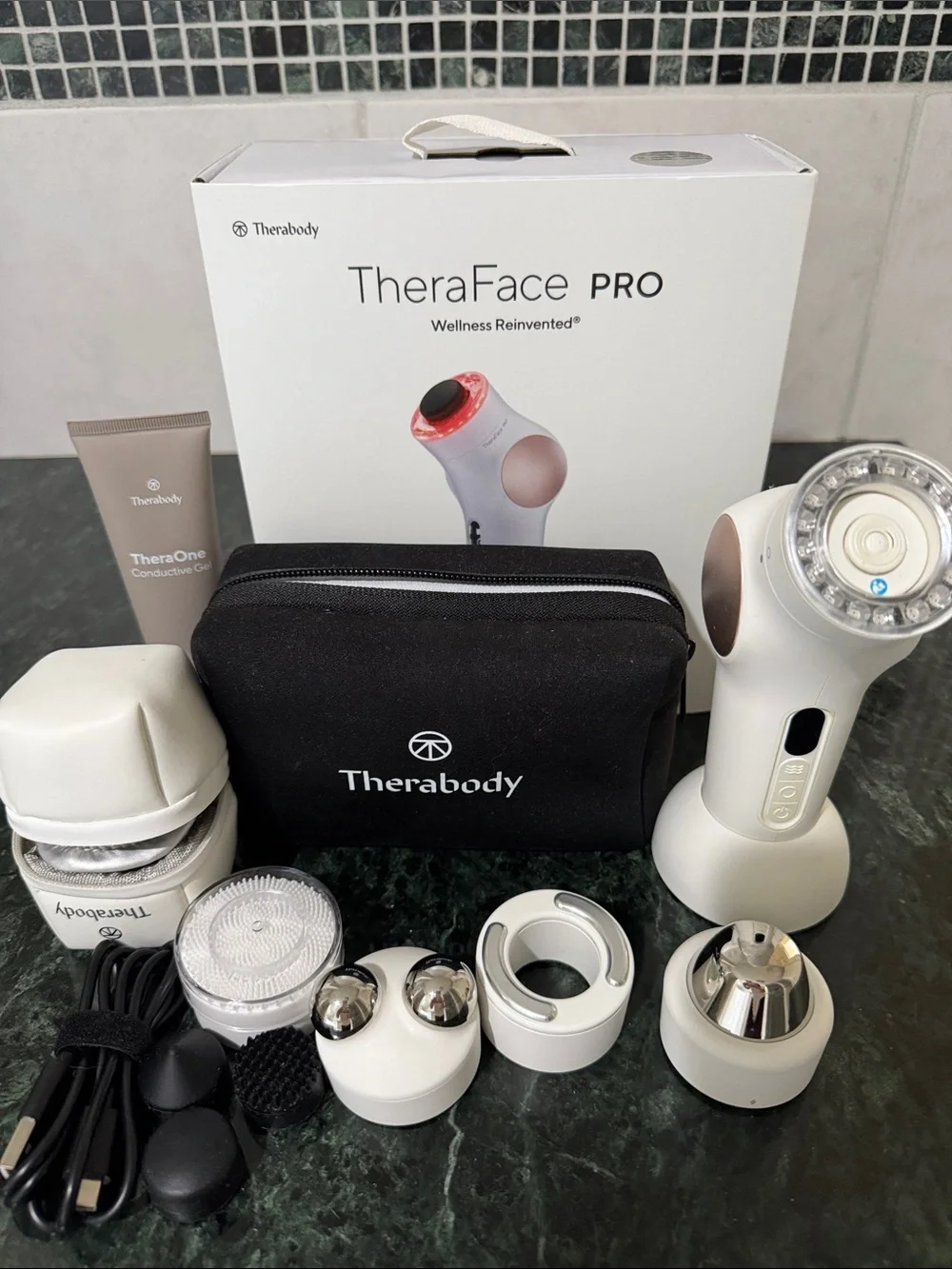 Therabody TheraFace PRO in White with Gold Accents
